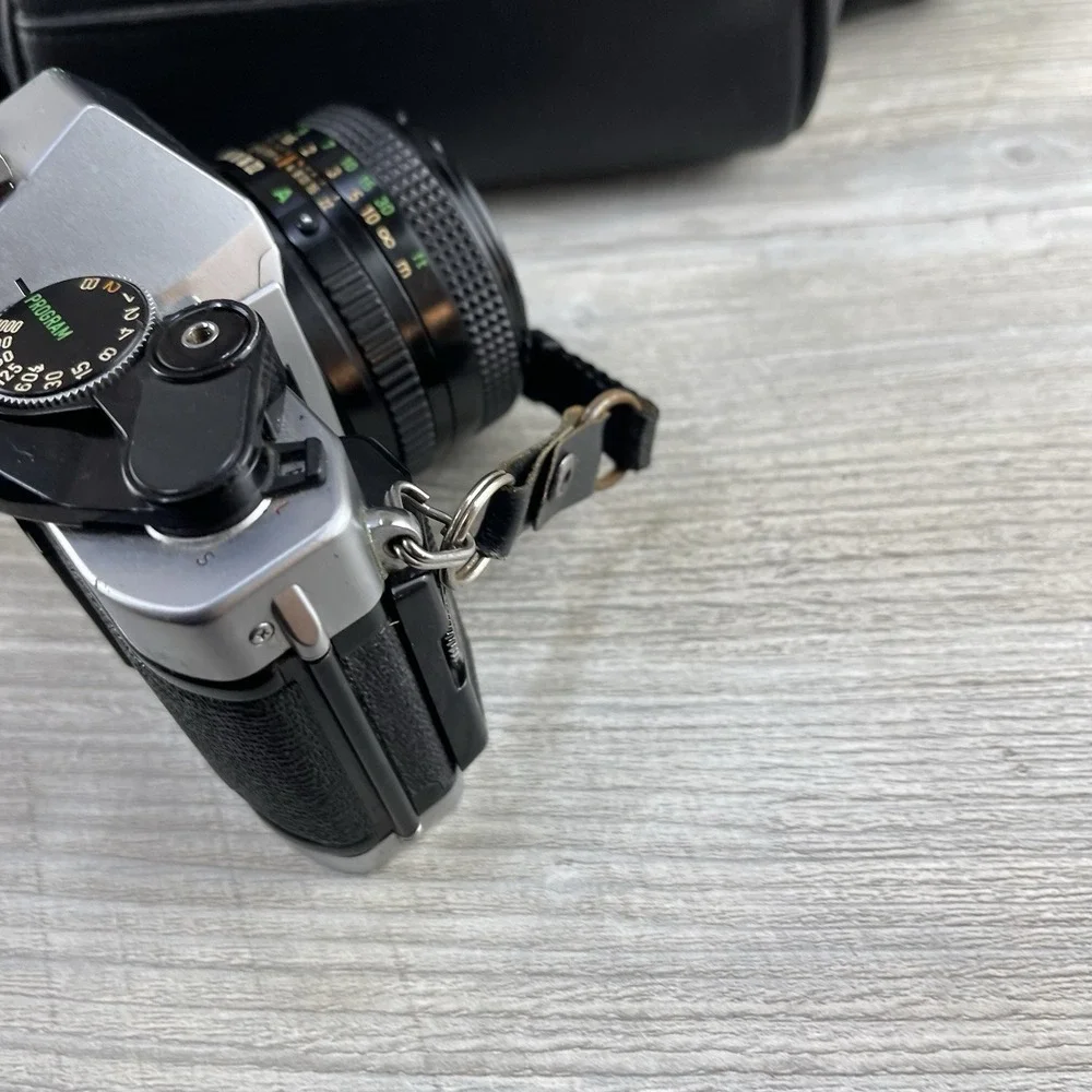 Canon AE-1 35mm SLR Film Camera w/ 50mm f/1.4 FD Lens